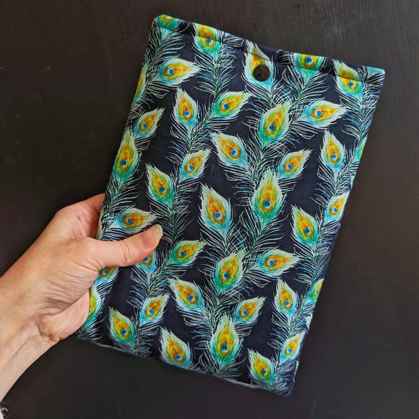 Peacock feathers book sleeve