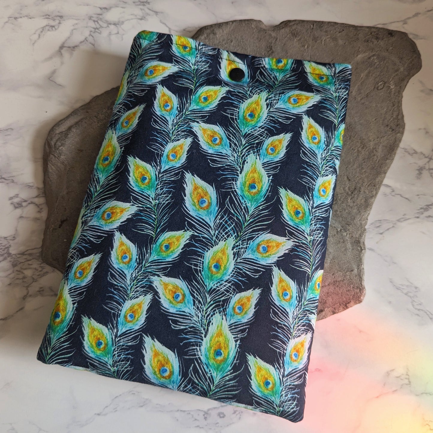 Peacock feathers book sleeve