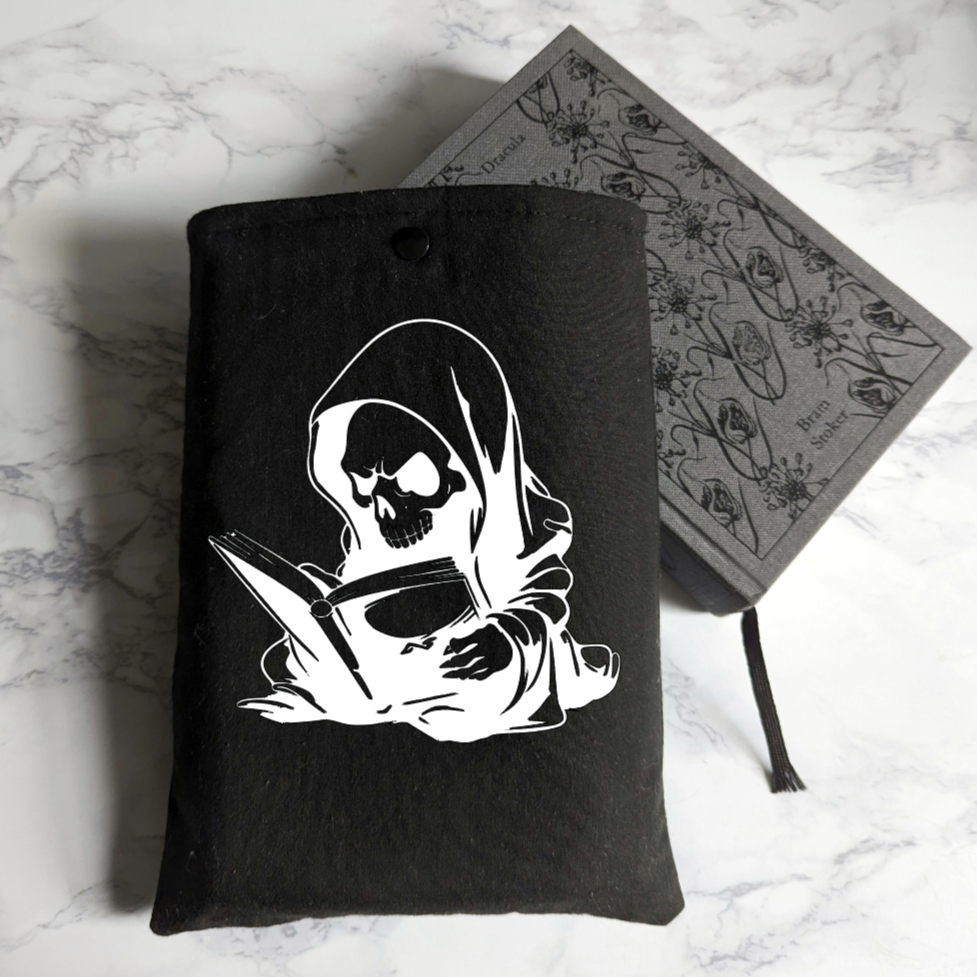 Reading skeleton book sleeve